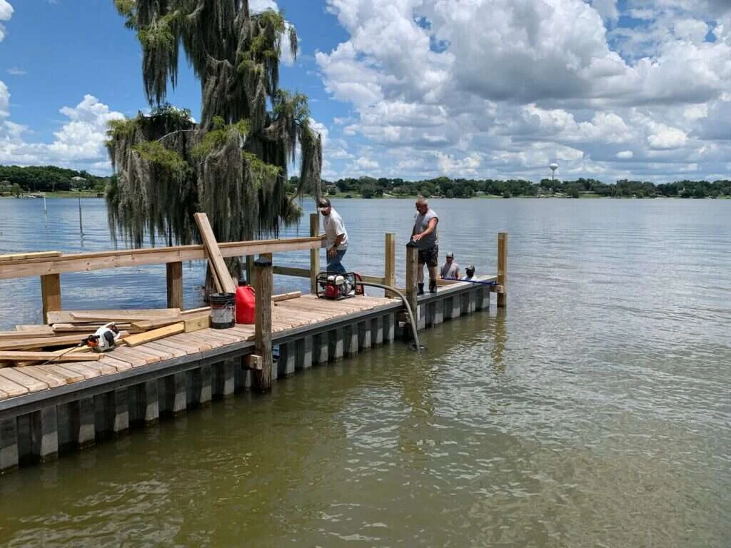 The repaired Lake Elbert fishing dock with new decking, handrails and an L-shaped extension